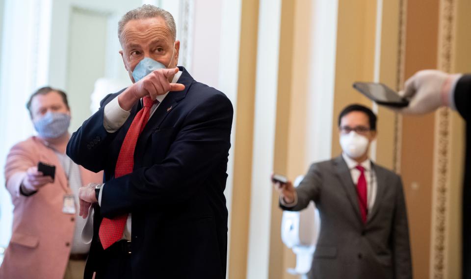 US Senate Minority Leader Chuck Schumer, Democrat of New York, wears a mask to protect himself and others from COVID-19, known as coronavirus, as he speaks to the press as the Senate returns into session at the US Capitol in Washington, DC, May 4, 2020. (Photo by SAUL LOEB / AFP) (Photo by SAUL LOEB/AFP via Getty Images)