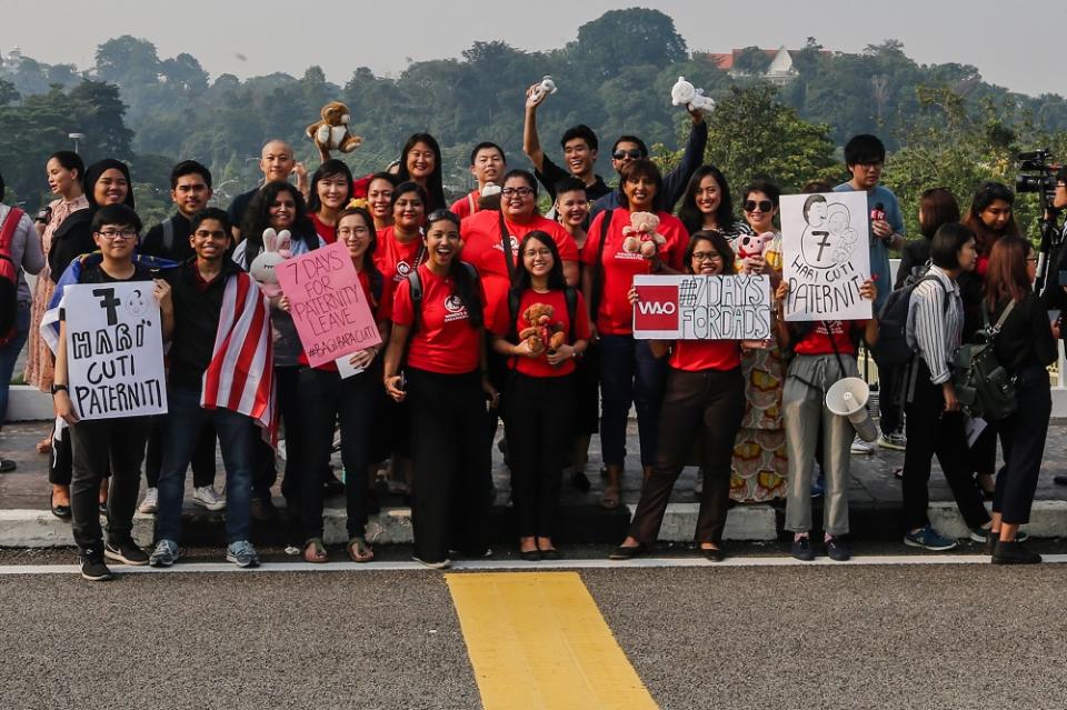 Women’s Aid Organisation members and activists hold placards outside the Parliament in Kuala Lumpur November 13, 2019.