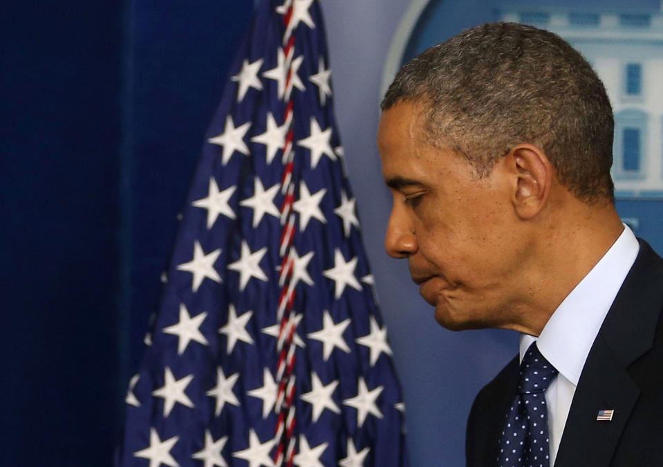 <p>President Barack Obama walks away after speaking about today’s bombing at the Boston Marathon, April 15, 2013 in Washington, DC. Two people are confirmed dead and at least 28 injured after at least two explosions went off near the finish line to the marathon. (Mark Wilson/Getty Images) </p>