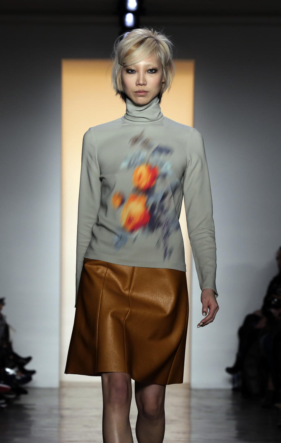 The Peter Som Fall 2014 collection is modeled during Fashion Week in New York, Friday, Feb. 7, 2014. (AP Photo/Richard Drew)