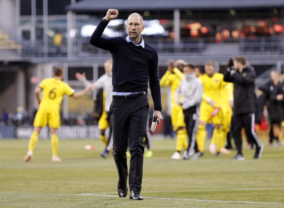 Columbus Crew SC head coach Gregg Berhalter pumps his fist as he thanks fans following the first leg of the MLS Cup Eastern Conference semifinal at Mapfre Stadium in Columbus on Nov.  4, 2018. The Crew will take a 1-0 lead to Red Bull Arena on Nov.  11 for the second leg. [Adam Cairns/Dispatch]