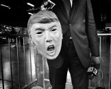 <p>A journalist holds a Donald Trump mask he was using as a prop ahead of a campaign rally on June 14 in Greensboro, N.C. (Photo: Holly Bailey/Yahoo News) </p>