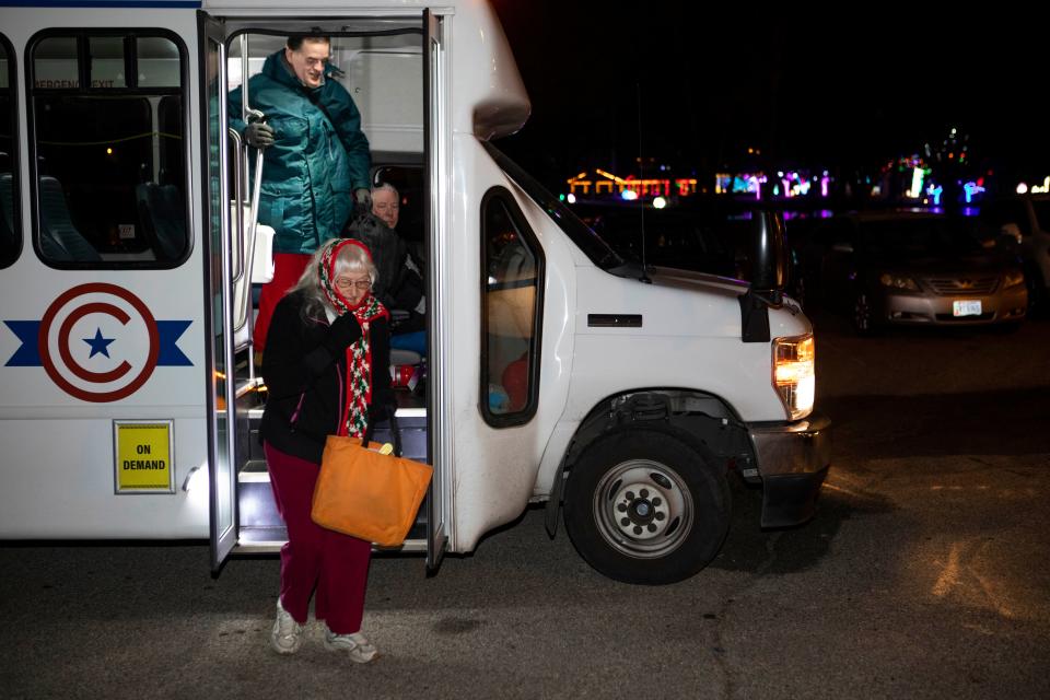 Jean Romero and Donnie Sanford, both of Chillicothe, get off the bus as driver Mark Fawley drops them off at the YMCA of Ross County to go and work out on Dec. 20, 2022 in Chillicothe, Ohio. The Chillicothe Transit System provides free transportation for local passengers in need of transportation around the Chillicothe area.