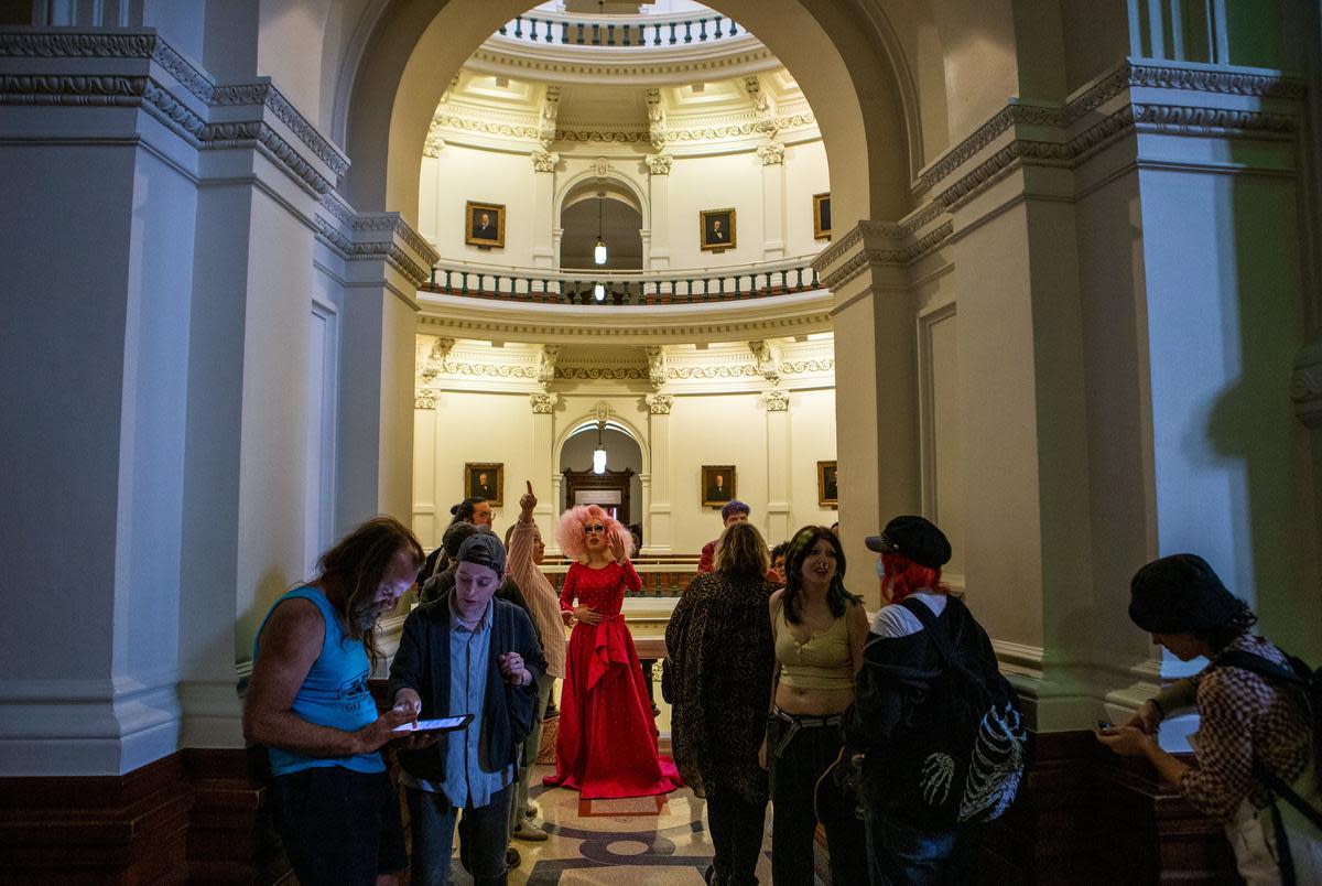 Drag artist Brigitte Bandit and other attendees wait to give witness testimony for the Senate’s discussion of SB12 in the Capitol rotunda on Mar. 23, 2023. The bill defines drag shows as sexually oriented performances and would fine businesses who host them in front of children.