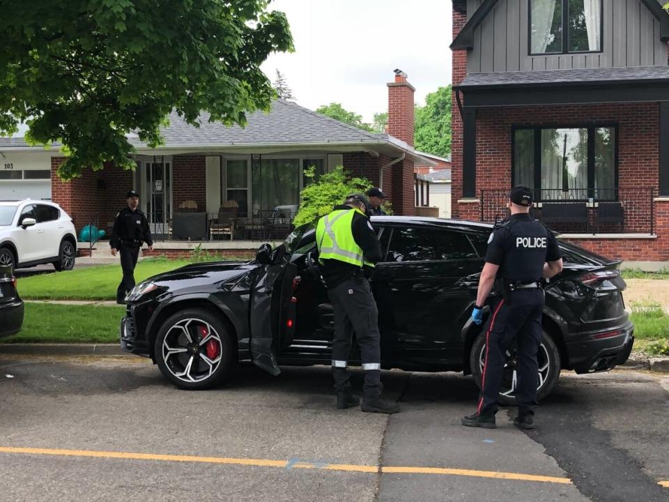 Toronto police say a car was recovered in the city's west end Thursday after a home invasion in the Fort York Boulevard and Spadina Avenue area. (Clara Pasieka/CBC - image credit)