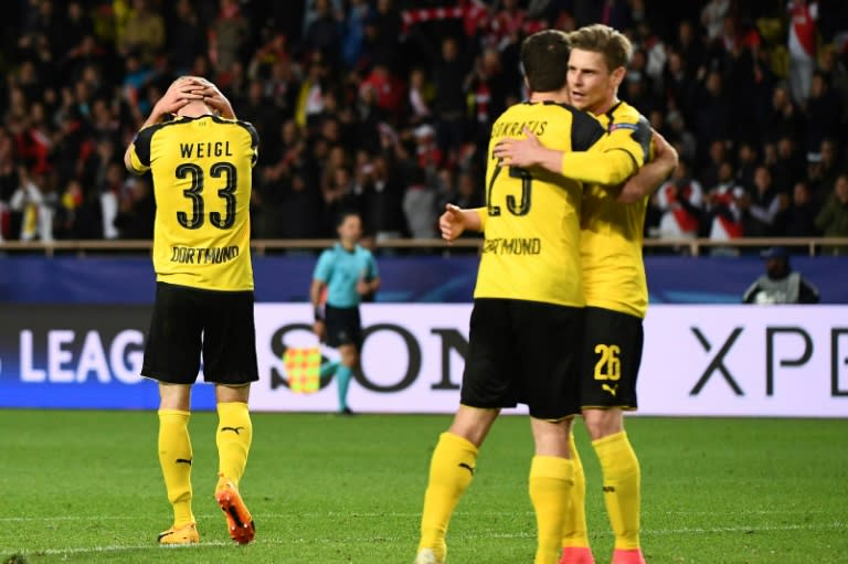 Dortmund's players react after losing against Monaco in their UEFA Champions League 2nd leg quarter-final football match on April 19, 2017 at the Louis II stadium in Monaco