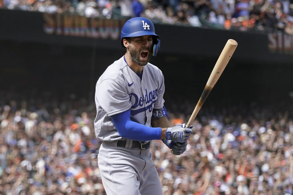 Los Angeles Dodgers' Chris Taylor reacts after striking out during the eighth inning of a baseball game against the San Francisco Giants in San Francisco, Sunday, June 12, 2022. (AP Photo/Jeff Chiu)