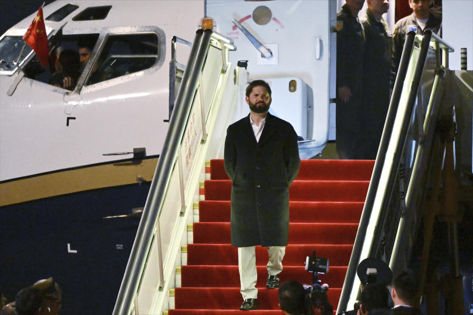 Chilean President Gabriel Boric arrives at Beijing's airport ahead of the Belt and Road Forum in the Chinese capital on Sunday, Oct. 15, 2023. (Jade Gao/Pool Photo via AP)