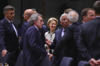 European Commission President Ursula von der Leyen, center, attends a round table meeting at an EU summit in Brussels, Thursday, Feb. 20, 2020. After almost two years of sparring the EU will be discussing the bloc's budget, to work out Europe's spending plans for the next seven years. (AP Photo/Olivier Matthys)