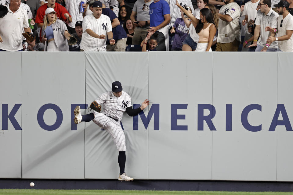 New York Yankees left fielder Ryan LaMarre can't make the catch on a double by Boston Red Sox's Christian Vazquez during the fifth inning of a baseball game Sunday, July 18, 2021, in New York. (AP Photo/Adam Hunger)