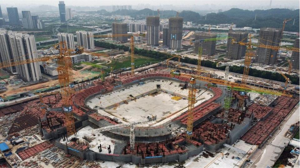 An aerial view shows the construction site of Guangzhou Evergrande Soccer Stadium, a new stadium for Guangzhou FC, developed by China Evergrande Group, in Guangzhou, Guangdong province, China September 26, 2021. Picture taken September 26, 2021 with a drone.