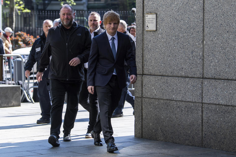 Ed Sheeran walks into Manhattan federal court on Tuesday, April 25, 2023, in New York. The heirs of Ed Townsend, Marvin Gaye's co-writer of the 1973 soul classic, sued Sheeran, alleging the English pop star's hit 2014 tune has “striking similarities” to “Let's Get It On” and “overt common elements” that violate their copyright.(AP Photo/Brittainy Newman)