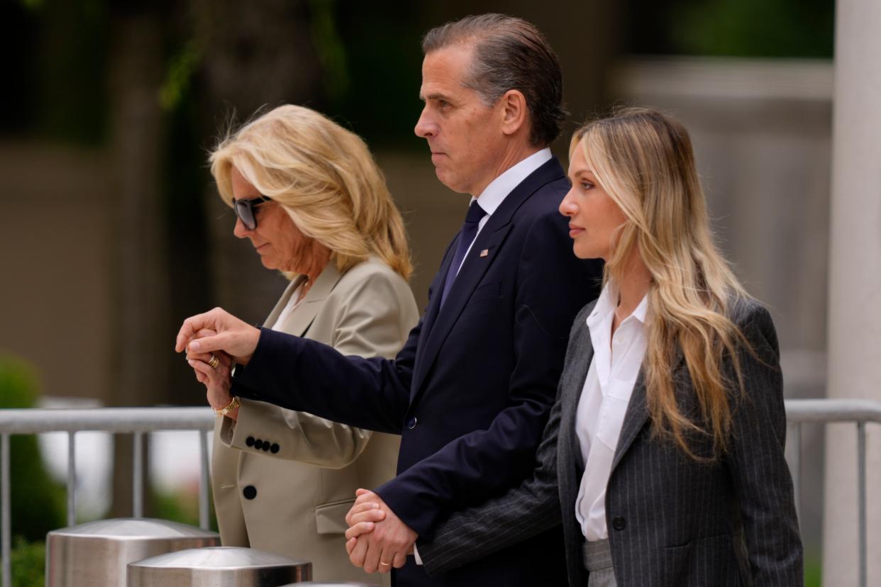 Hunter Biden, center, President Joe Biden's son, accompanied by his mother, first lady Jill Biden, left, and his wife, Melissa Cohen Biden, right, walking out of federal court after hearing the verdict, Tuesday, June 11, 2024, in Wilmington, Del. (AP)