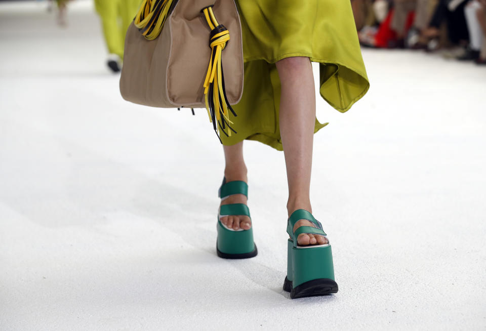 A model wears a creation as part of the Sunnei men's Spring-Summer 2020 collection, unveiled during the fashion week in Milan, Italy, Sunday, June 16, 2019. (AP Photo/Antonio Calanni)