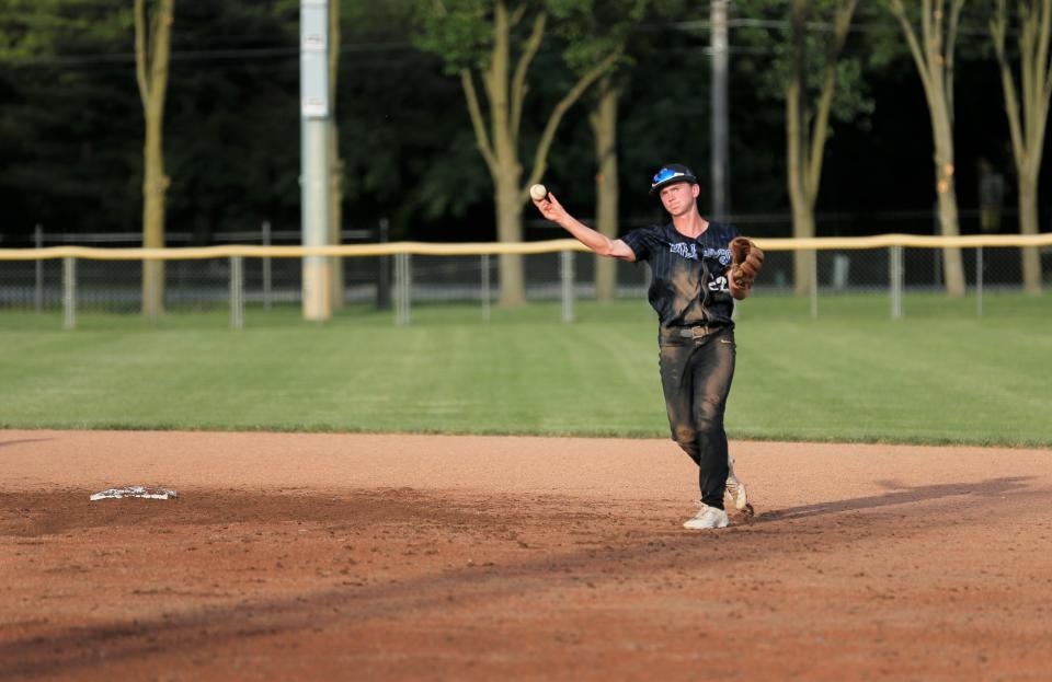 Centerville sophomore Kollyn Peed throws the ball to first base during a regional game against Heritage Christian June 4, 2022.