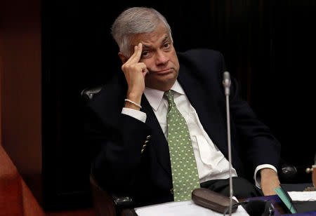 Sri Lanka's ousted Prime Minister Ranil Wickremesinghe looks on during a parliament session in Colombo, Sri Lanka December 5, 2018. REUTERS/Dinuka Liyanawatte/File Photo