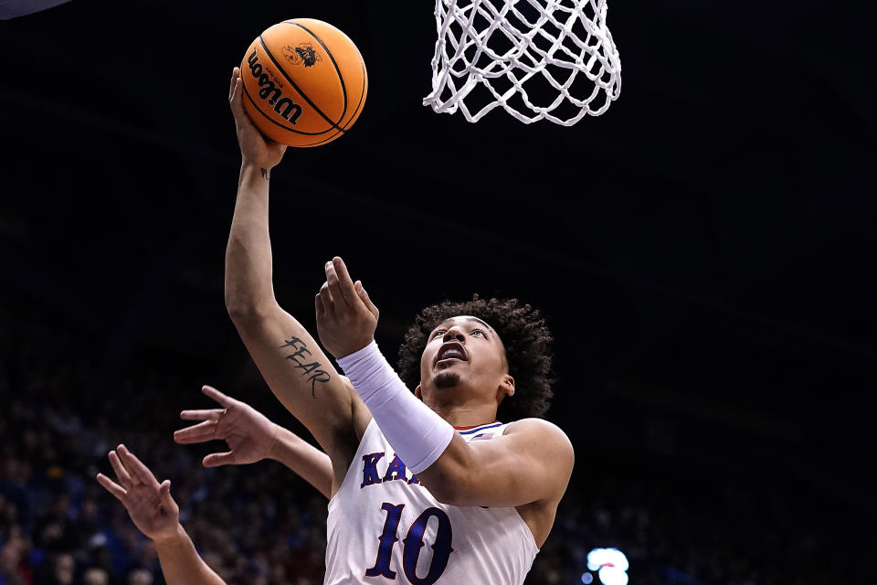 Kansas forward Jalen Wilson puts up a shot during the first half of an NCAA college basketball game against Southern Utah Friday, Nov. 18, 2022, in Lawrence, Kan. (AP Photo/Charlie Riedel)