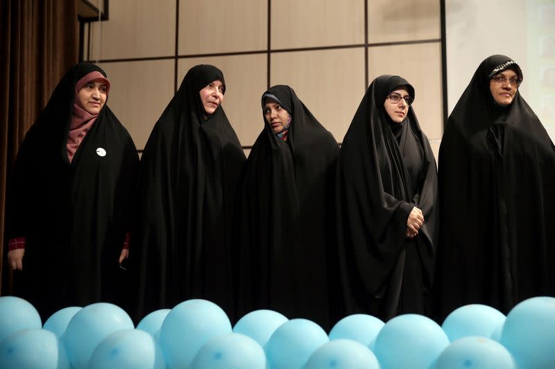 Iranian parliamentary candidates take part in an election campaign event in Tehran