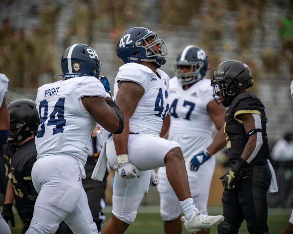 Georgia Southern defensive end Dillon Springer (42) celebrates a play against Army at Michie Stadium on Nov. 21, 2020 in West Point, New York.