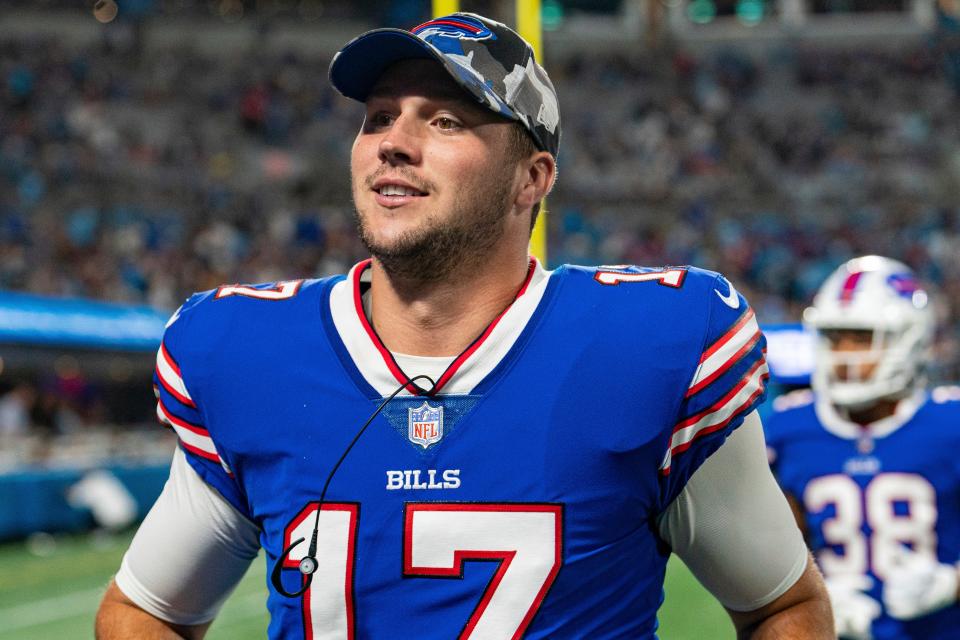 Buffalo Bills quarterback Josh Allen walks off the field at half time during an NFL preseason football game against the Carolina Panthers on Friday, Aug. 26, 2022, in Charlotte, North Carolina.