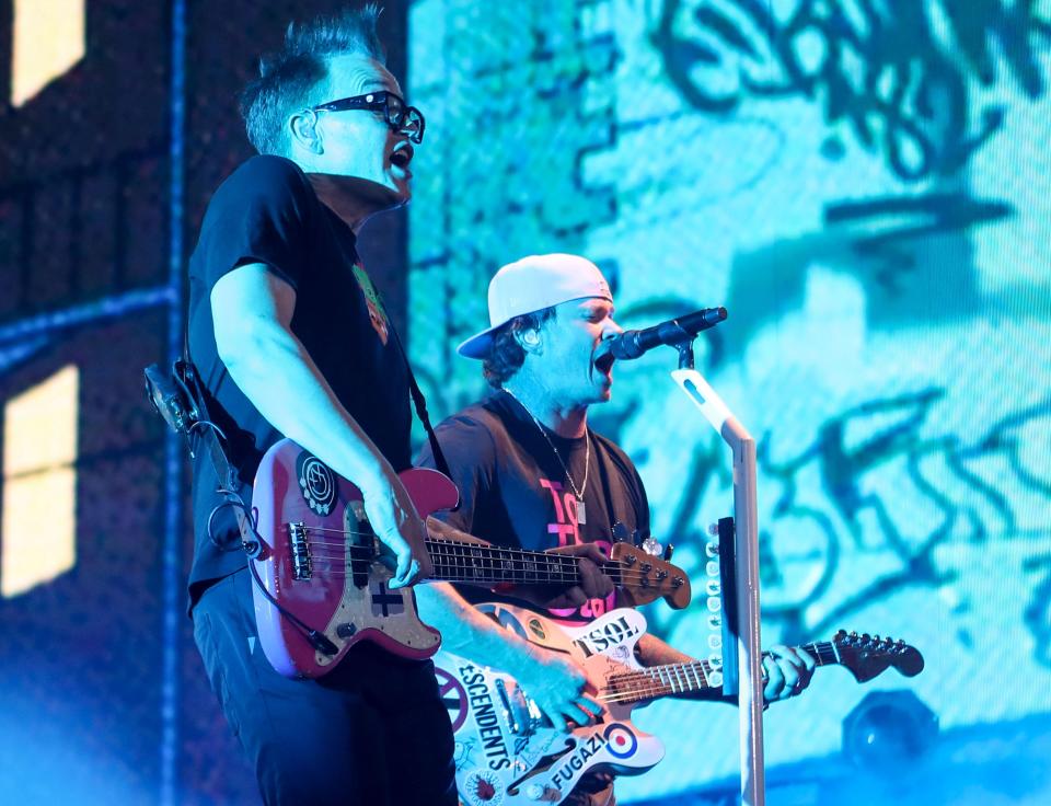Mark Hoppus and Tom DeLonge of Blink-182 are seen performing in April during the second week of Coachella.