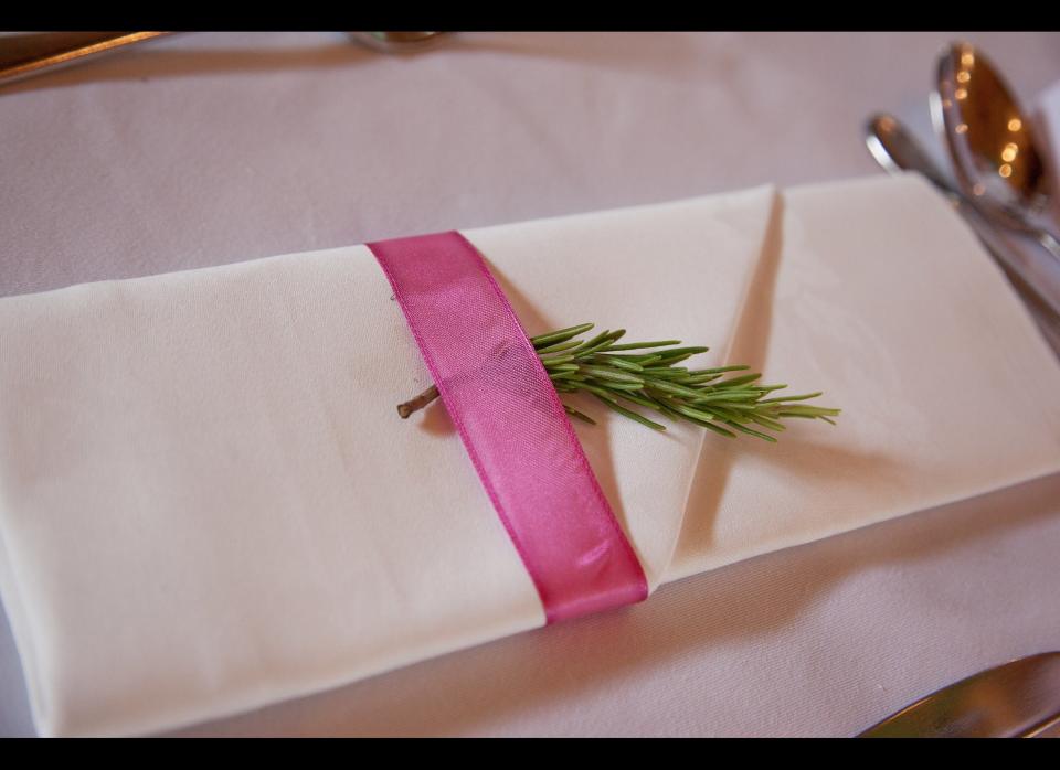 Ribbon is a great napkin ring fall back. After wrapping it around, try tucking a branch of rosemary underneath to enhance the overall look.     Flickr Photo by <a href="http://www.flickr.com/photos/philhawksworth/4943453342/in/photostream/" target="_hplink">Phil Hawksworth</a>