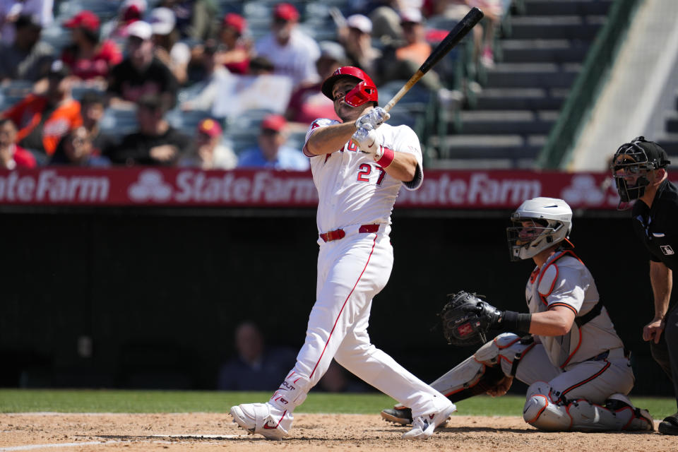 Los Angeles Angels designated hitter Mike Trout hits a home run during the sixth inning of a baseball game against the Baltimore Orioles in Anaheim, Calif., Wednesday, April 24, 2024. (AP Photo/Ashley Landis)