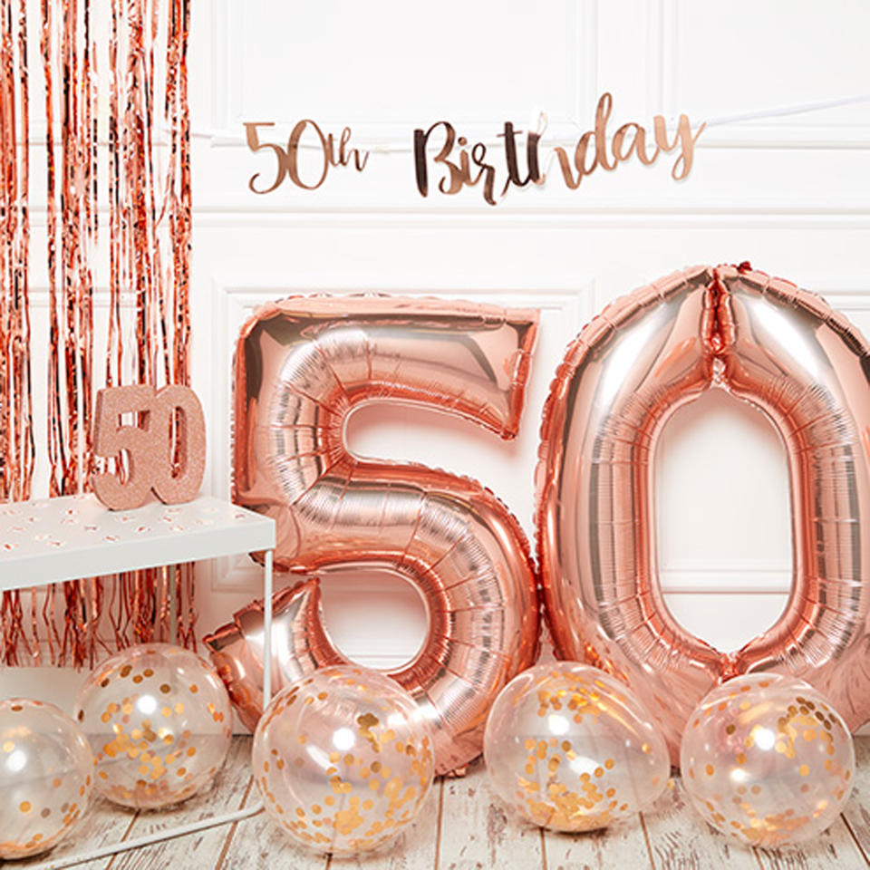 50th birthday banner and balloons