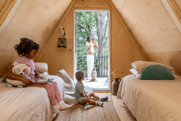 The children’s bedroom features access to the refinished outdoor deck