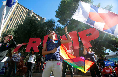 Opposing protesters gather during demonstrations on the campus of University of Nevada, Las Vegas, before the last 2016 U.S. presidential debate in Las Vegas, Nevada, U.S., October 19, 2016. REUTERS/Jim Urquhart