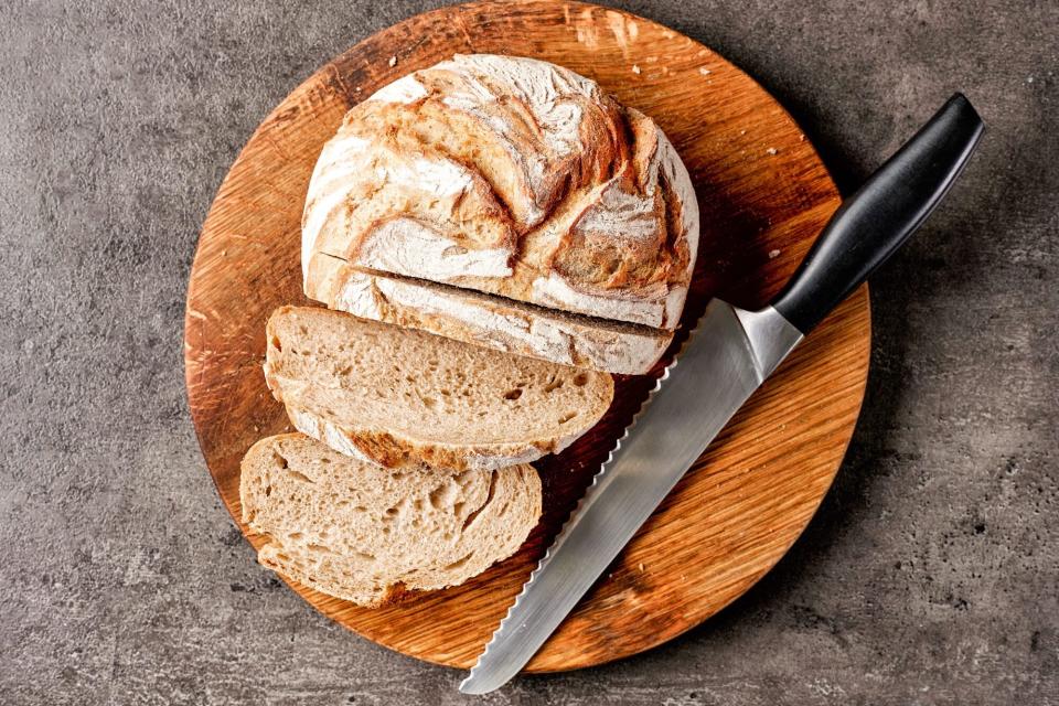 Freshly baked bread and knife