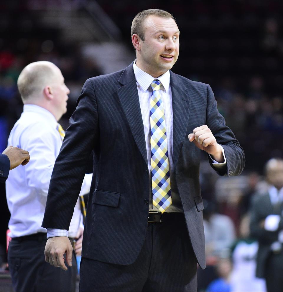 Northern Kentucky assistant coach Eric Haut, a former standout player and long-time assistant coach at Kent State, will be on the visitors bench at the M.A.C. Center on Sunday.