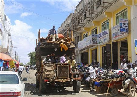 A truck drives through Bakara market in Mogadishu October 5, 2013. REUTERS/Feisal Omar