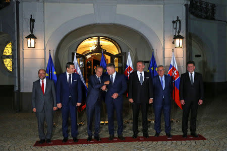 European Council President Donald Tusk (3rdL), European Commission President Jean-Claude Juncker (2ndR) and European Parliament President Martin Schulz (L) pose for a group photo with Slovakia's Prime Minister Robert Fico (C), Slovakia's President Andrej Kiska (3rdR) and Speaker of the Slovakia's National Council Andrej Danko (2ndL) at the Government office ahead of the upcoming European Union summit- the first one since Britain voted to quit- in Bratislava, Slovakia, September 15, 2016. REUTERS/Yves Herman