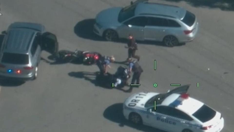still from wa police video of motorbike crash and arrest