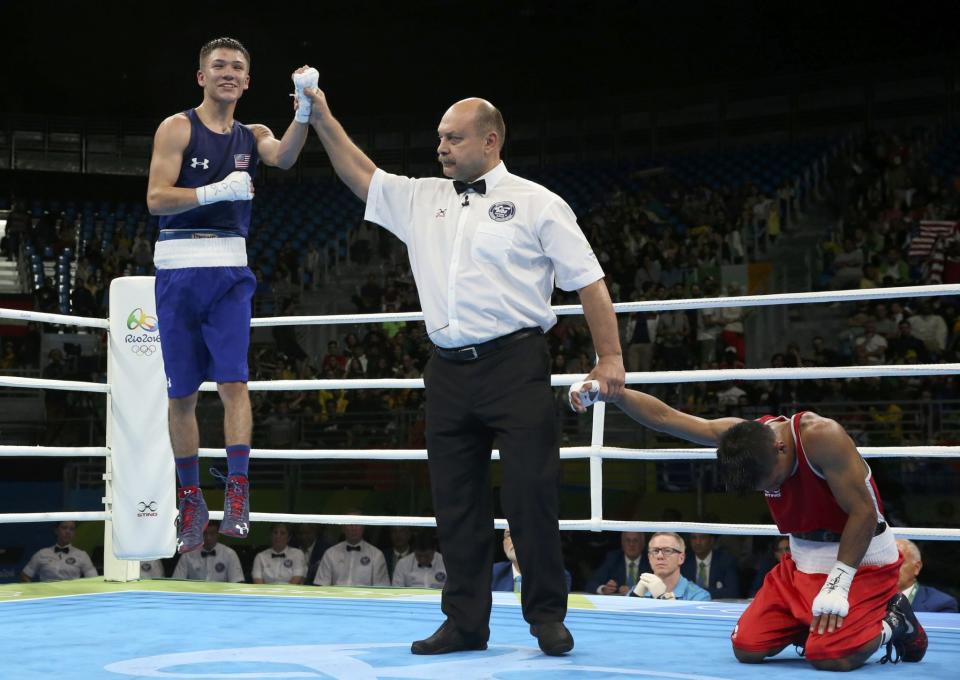 <p>Nico Miguel Hernandez (USA) of USA celebrates after winning his bout against Carlos Quipo (ECU) of Ecuador. REUTERS/Adrees Latif </p>