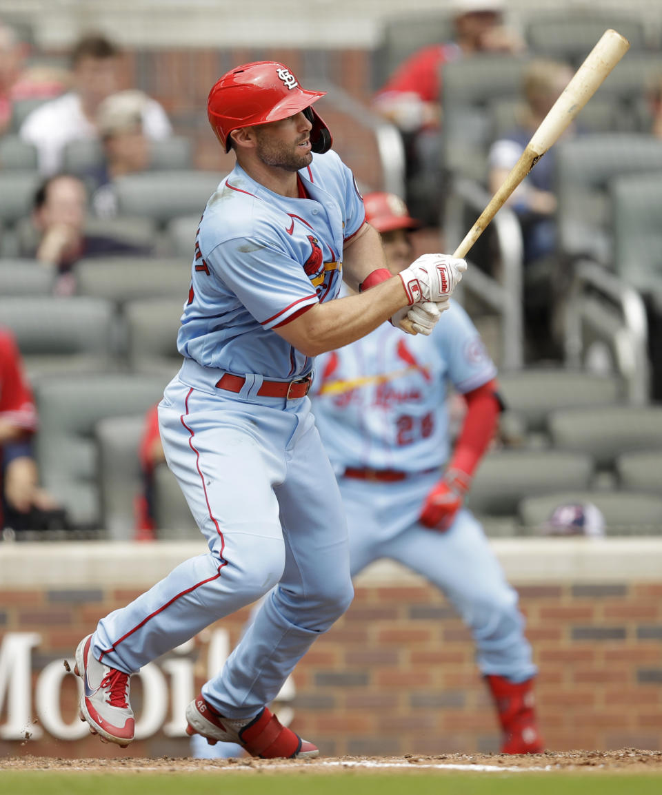St. Louis Cardinals' Paul Goldschmidt swings for an RBI-single off Atlanta Braves' Sean Newcomb during the sixth inning of the first baseball game of a doubleheader on Sunday, June 20, 2021, in Atlanta. (AP Photo/Ben Margot)