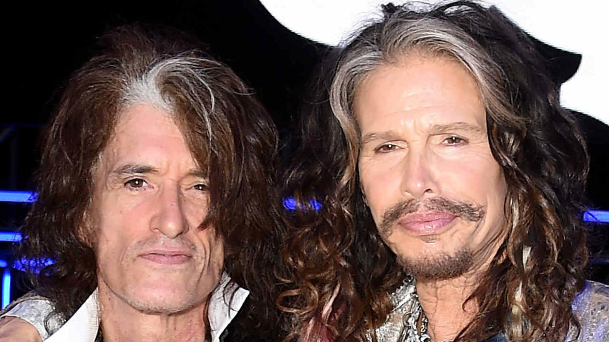  Joe Perry and Steven Tyler at an awards ceremony 