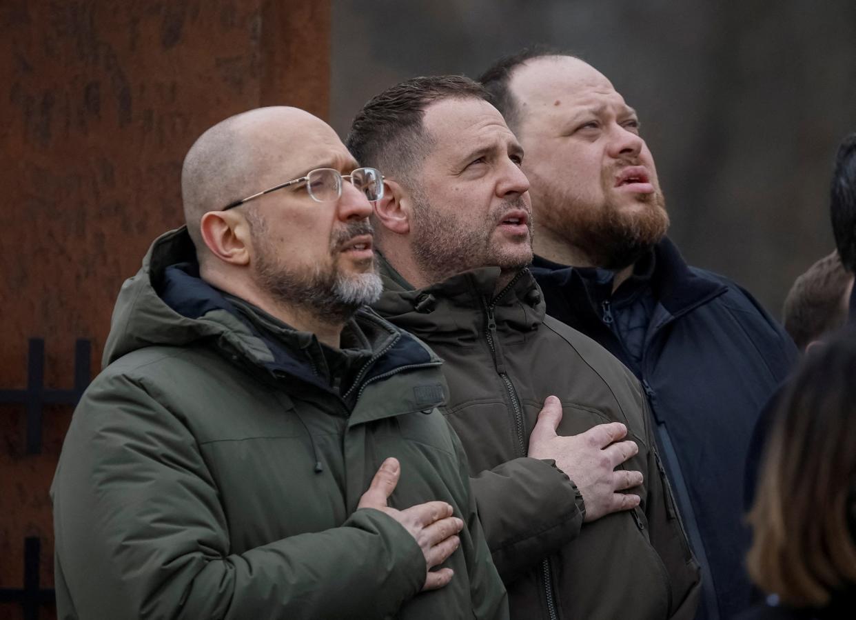 Ukrainian Prime Minister Denys Shmyhal, head of Ukraine's Presidential Office Andriy Yermak and Ukrainian Parliament Speaker Ruslan Stefanchuk attend a ceremony (REUTERS)