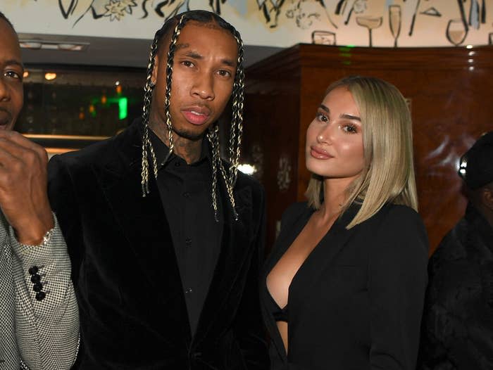 Tyga and Camaryn pose at an event