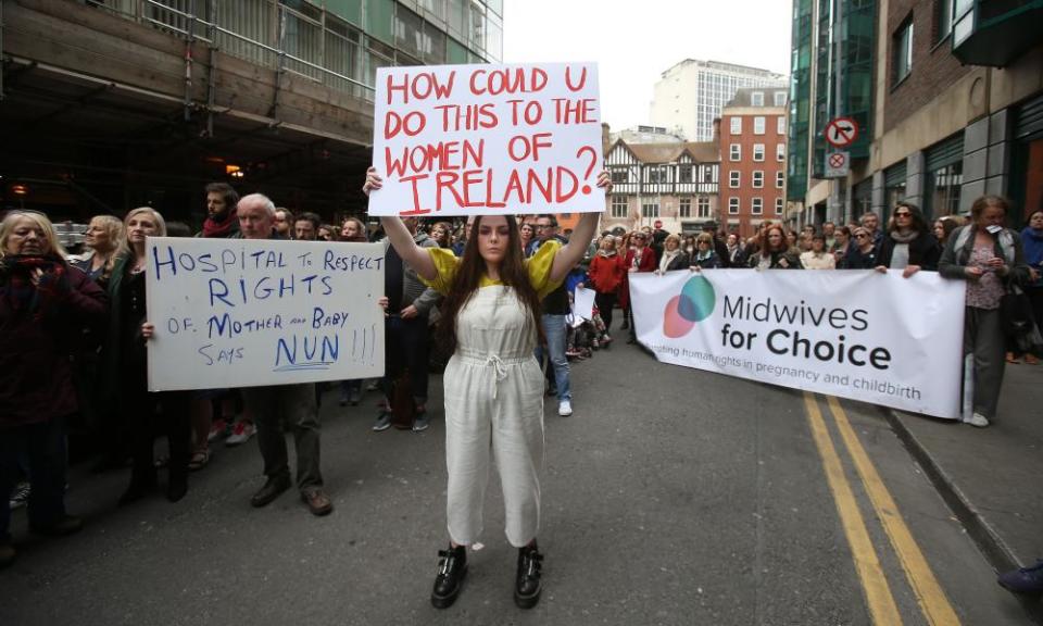 People protest in Dublin over plans to grant ownership of the maternity hospital to the Sisters of Charity religious order