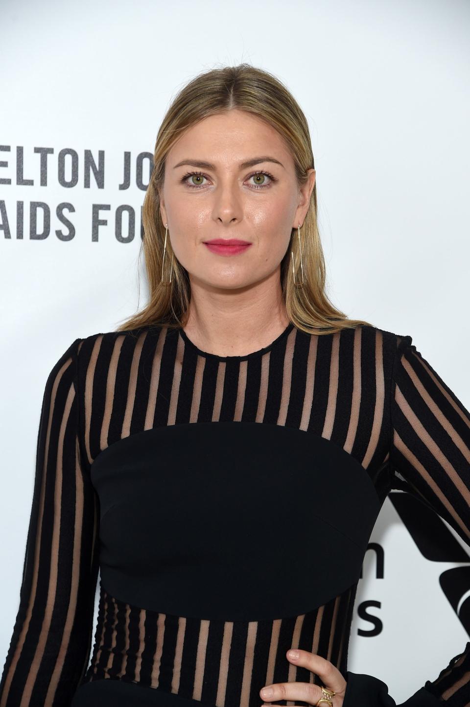 <h1 class="title">Maria Sharapova</h1><cite class="credit">Photo: Getty Images</cite>