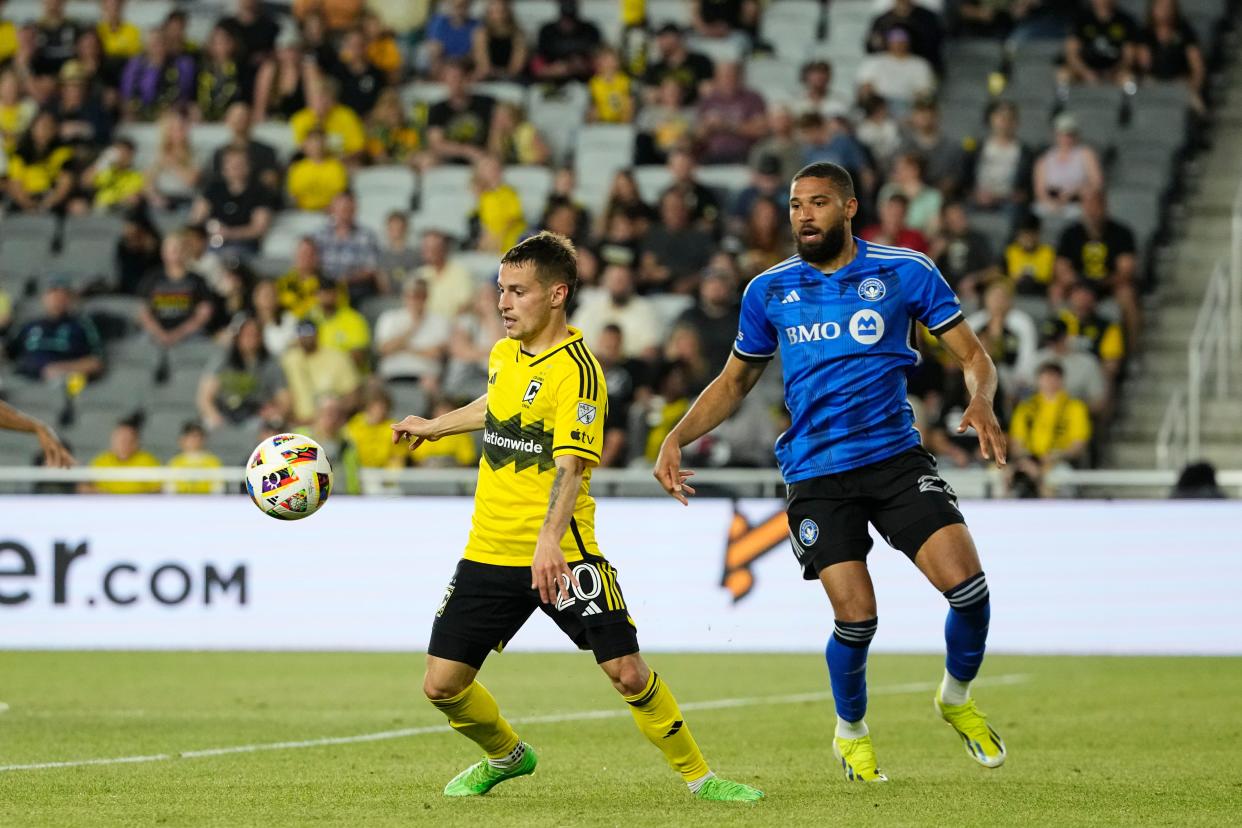 Apr 27, 2024; Columbus, Ohio, USA; Columbus Crew midfielder Alexandru Matan (20) plays the ball in the second half against the CF Montreal at Lower.com Field. Mandatory Credit: Adam Cairns-USA TODAY Sports