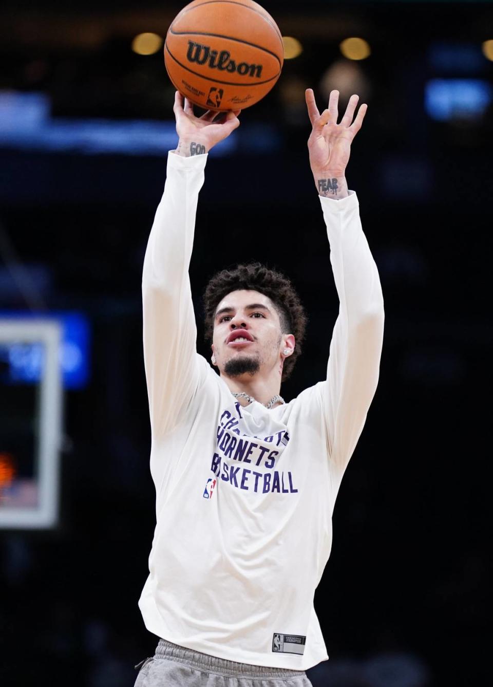 Charlotte Hornets guard LaMelo Ball (1) warms up before the start of the game against the Boston Celtics at TD Garden.