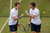 LONDON, ENGLAND - JULY 28: Andy Murray and Jamie Murray of Great Britain play against Alexander Peya and Jurgen Melzer of Austria during their Men's Doubles Tennis match on Day 1 of the London 2012 Olympic Games at the All England Lawn Tennis and Croquet Club in Wimbledon on July 28, 2012 in London, England. (Photo by Clive Brunskill/Getty Images)