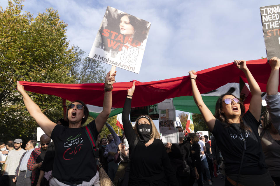 Demonstrators chant as they protest against the Iranian regime, in Washington, Saturday, Oct. 22, 2022, following the death of Mahsa Amini in the custody of the Islamic republic's notorious "morality police." (AP Photo/Jose Luis Magana)