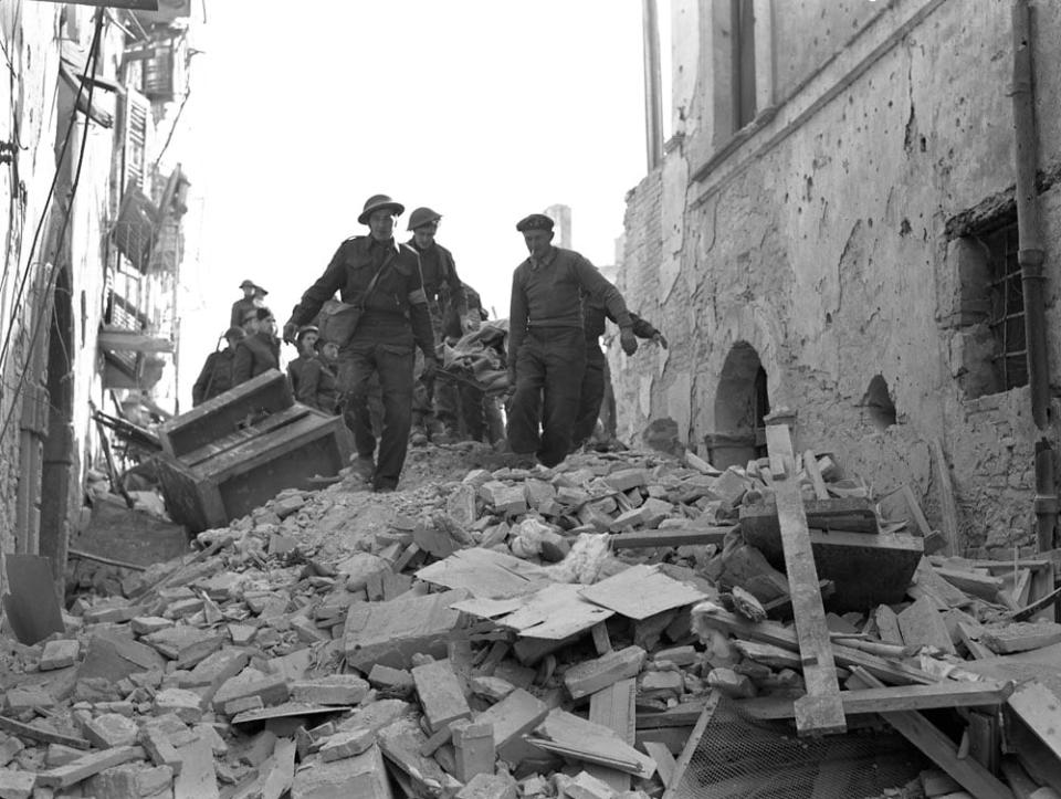 A Canadian soldier is rescued on Dec. 30, 1943, in Ortona, Italy.