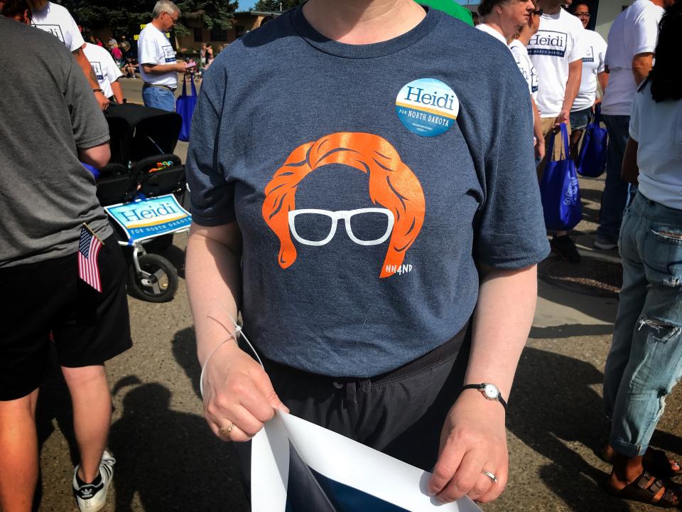 A supporter wears a shirt featuring Sen. Heidi Heitkamp’s famous red hair during a parade in Dickinson, N.D. (Photo: Holly Bailey/Yahoo News)