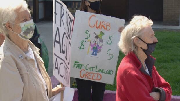Tenants rallied outside Main Square Apartments in east end Toronto on Saturday, demanding that landlords stop increasing rents through what are called above guideline rent increases. (Keith Burgess/CBC - image credit)