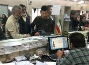 Afghan refugees submit documents at the Soleimankhani centre for refugees in Tehran, October 24, 2016. Picture taken on October 24, 2016. REUTERS/Gabriela Baczynska